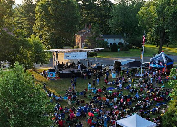 Five person outdoor concert performance